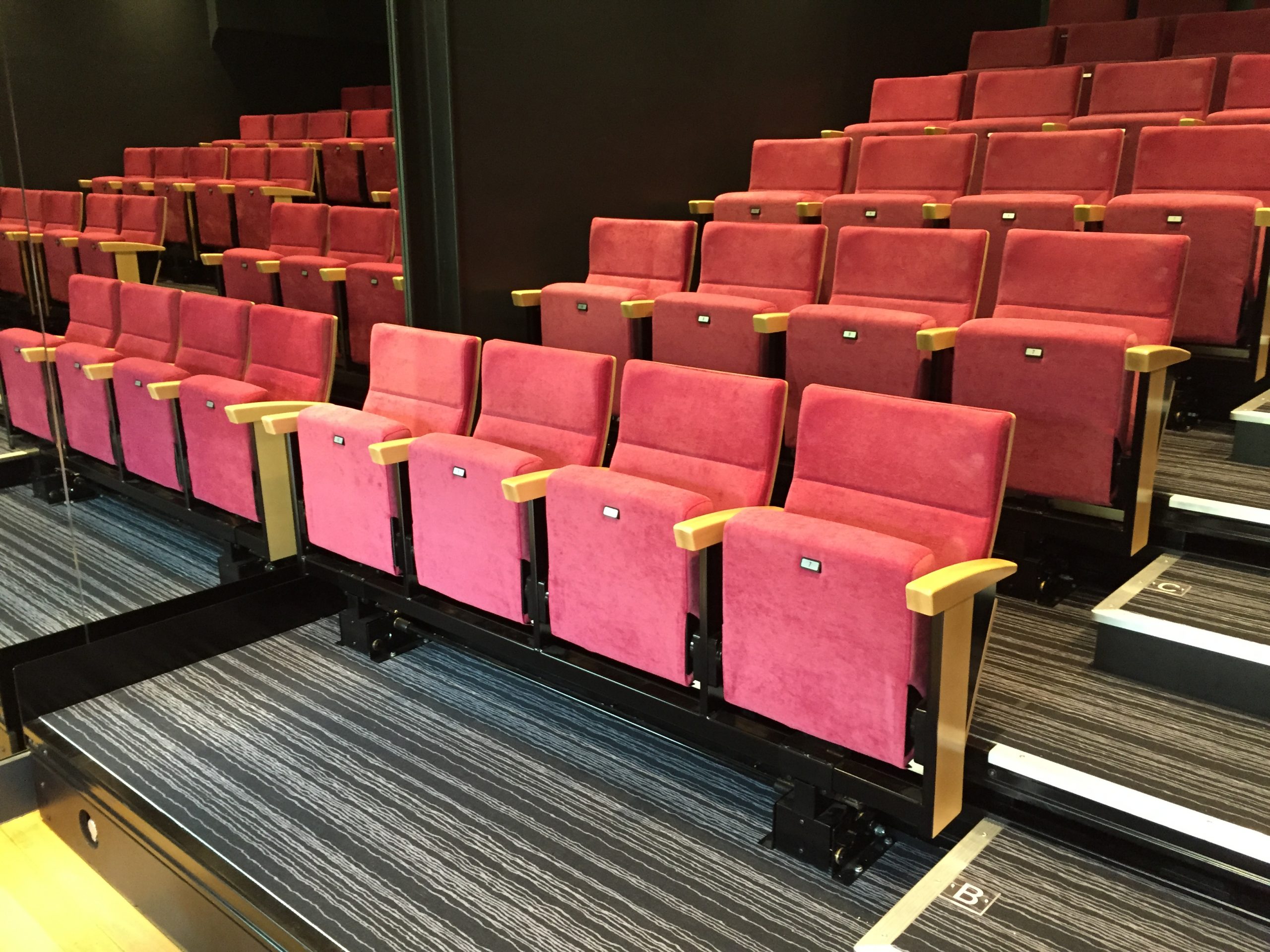 Recital folding armchair for retractable bleacher