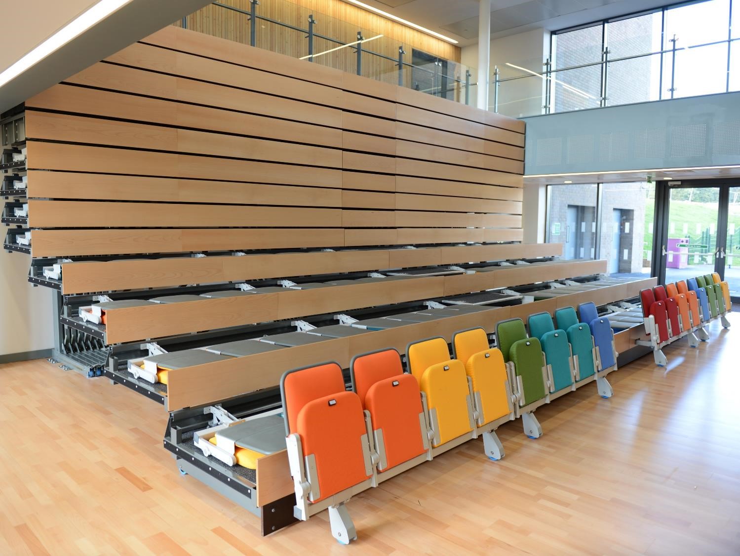 Example of a telescopically retractable, collapsible seating system